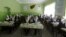 FILE - Class 11 Afghan girl students attend a class at Zarghona high school in Kabul, Afghanistan, Aug. 15, 2015. 