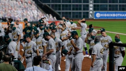 Astros, A's hold 42-second moment of silence, walk out before game