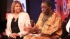 Usifo Edward Asikhia, a Nigerian physician, talks about autism challenges during a special edition of "Straight Talk Africa." Looking on is Susan Daniels of the U.S. National Institute of Mental Health. (B. Workinger/VOA)