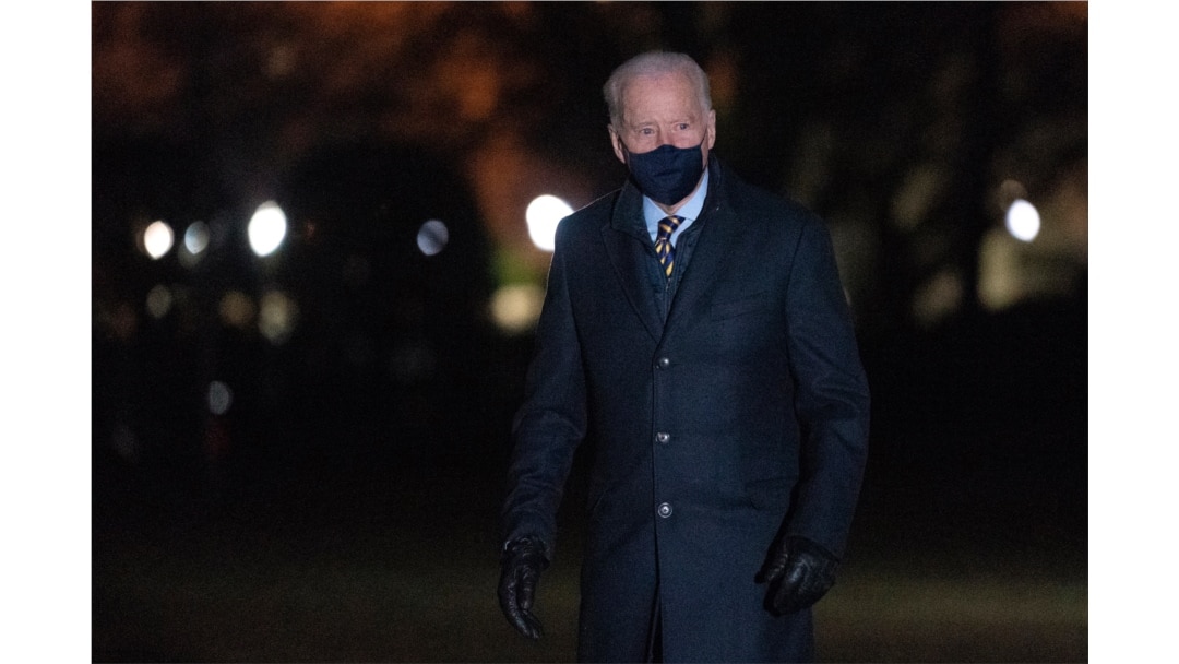 President Joe Biden walks on the South Lawn of the White House after stepping off Marine One, Feb. 17, 2021, in Washington.