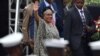 Kenya’s first lady, Margaret Kenyatta, waves to supporters as she arrives in Nairobi on Oct. 20, 2017, to commemorate Mashujaa (Heroes) Day.