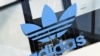 FILE - The Adidas logo is pictured during celebrations for German sports apparel maker Adidas' 70th anniversary at the company's headquarters in Herzogenaurach, Germany, August 9, 2019.