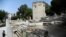 Tourists visit the Tower of the Winds, open to the public for the first time in more than 200 years after being restored, in the Roman Agora, in Plaka, central Athens, Greece, Aug. 23, 2016. 