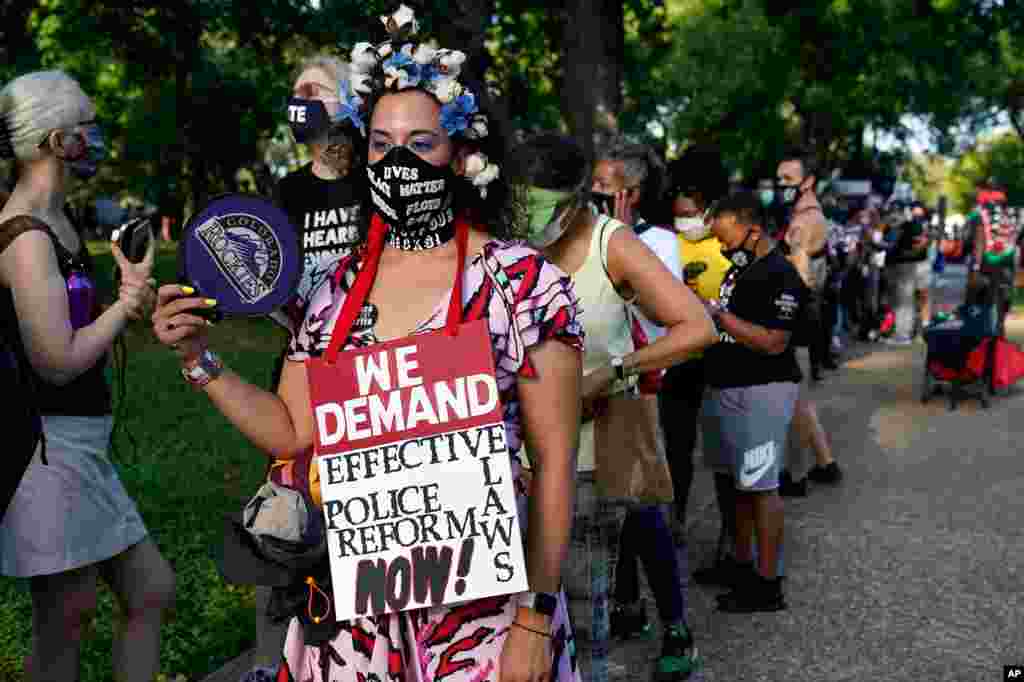 Megan Dogans of Denver, arrives to attend the March on Washington, Aug. 28, 2020, at the Lincoln Memorial in Washington.