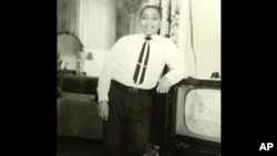 FILE - Emmett Louis Till, the murdered Chicago teenager whose body was found in the Tallahatchie River, Mississippi, in 1955. 