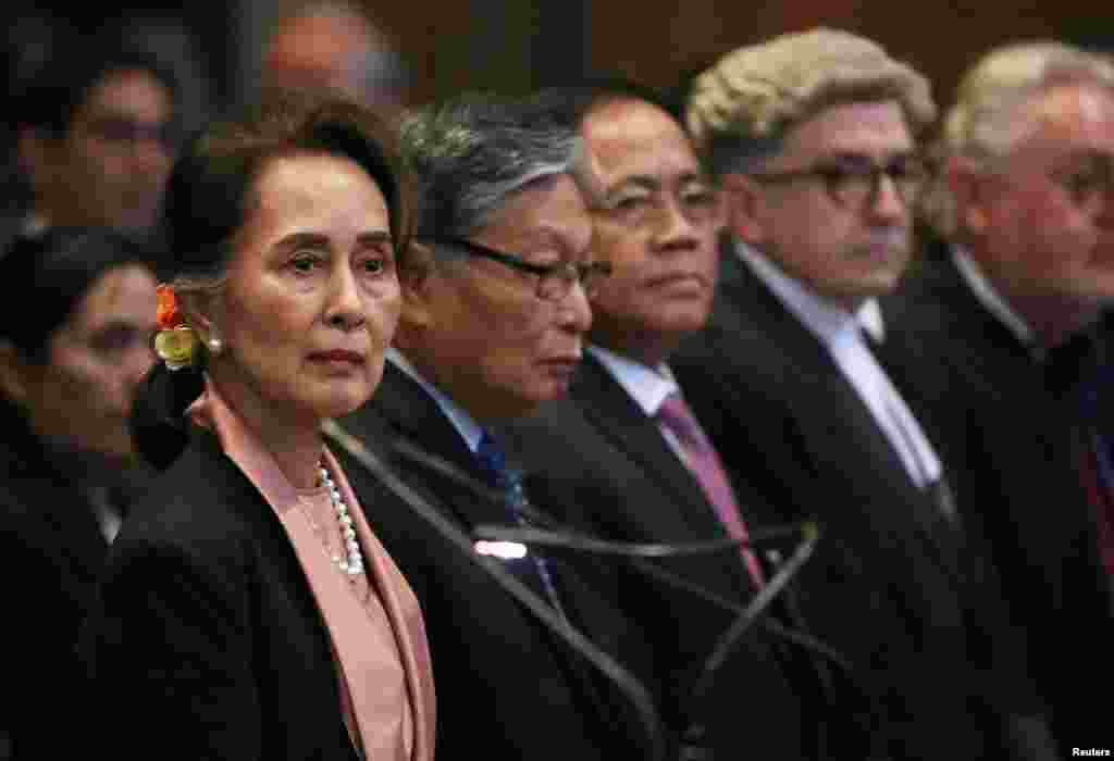 Myanmar&#39;s leader Aung San Suu Kyi attends a hearing in a case filed by Gambia against Myanmar alleging genocide against the minority Muslim Rohingya population, at the International Court of Justice (ICJ) in The Hague, Netherlands December 10, 2019. REUT