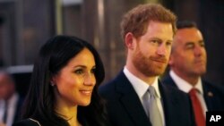 Pangeran Harry dan Meghan Markle menghadiri resepsi yang diadakan Perdana Menteri Australia Malcolm Turnbull dan istrinya Lucy Turnbull di Australia House, London, 21 April 2018.