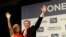 John Tory waves with his wife Barbara Hackett after being elected as mayor in Toronto, Oct. 27, 2014. 