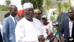 FILE - Nigerian presidential candidate Atiku Abubakar of the People's Democratic Party, speaks to journalists at his residence in Yola, Nigeria, Feb. 16, 2019.