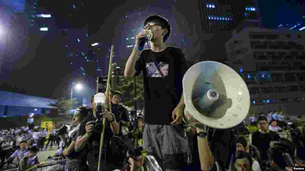Joshua Wong, leader of the student movement, delivers a speech, outside the offices of Hong Kong's Chief Executive Leung Chun-ying in Hong Kong.