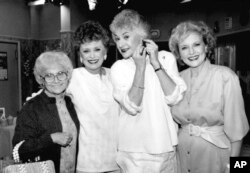 FILE - Actors from the television series "The Golden Girls" stand together during a break in taping in Hollywood, Dec. 25, 1985. From left are Estelle Getty, Rue McClanahan, Bea Arthur and Betty White.
