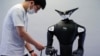 Japanese Stores Test Robot Workers 