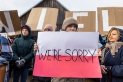 Chanting "shame" and "no one is illegal," women take part in demonstration initiated by Polish mothers in front of the border guard office in Micholowo, Poland, to protest the deportation of migrants to Belarus on October 23, 2021.
