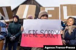 Chanting 'shame' and 'no one is illegal,' women take part in demonstration initiated by Polish mothers in front of the border guard office in Micholowo, Poland, to protest the deportation of migrants to Belarus on October 23, 2021.