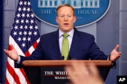 White House press secretary Sean Spicer speaks during the daily press briefing at the White House in Washington, Feb. 2, 2017. Spicer said the type of change made Thursday regarding a change in sanctions on Russia was a "fairly common practice."