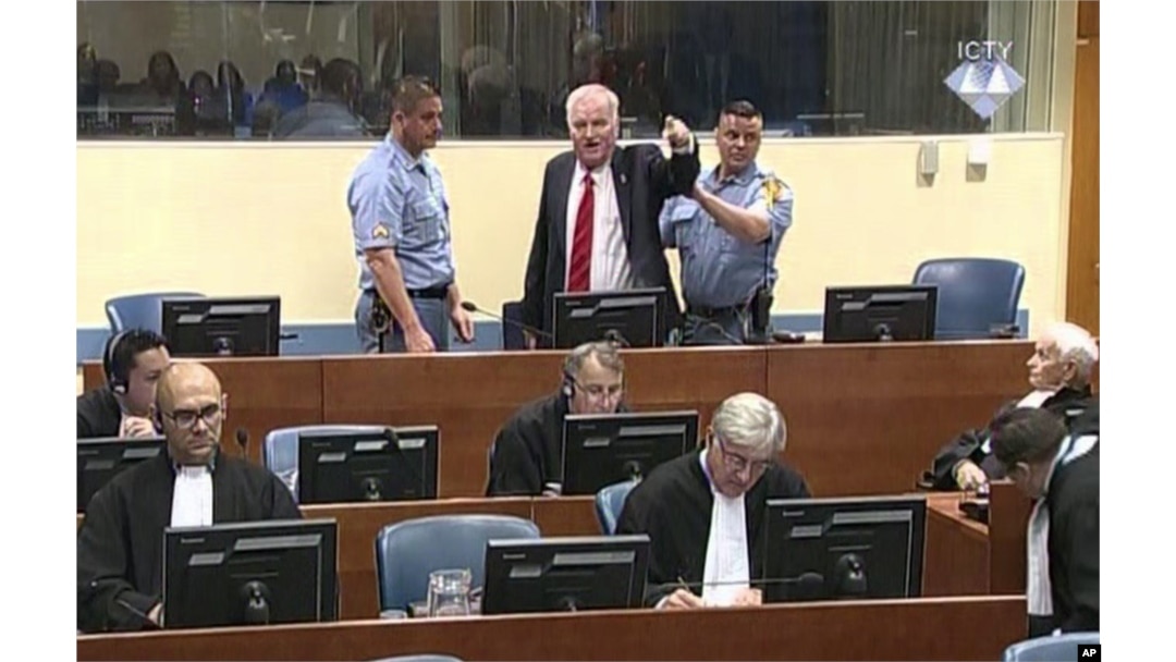 Bosnian Serb military chief Ratko Mladic during an angry outburst in the Yugoslav War Crimes Tribunal in The Hague, Netherlands, Nov. 22, 2017. (ICTY via AP)