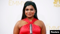 FILE - Mindy Kaling arrives at the 66th Primetime Emmy Awards in Los Angeles, California, Aug. 25, 2014. 