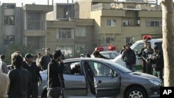 This photo released by the Fars News Agency is said to show one of the damaged cars following bomb attacks on the vehicles of two nuclear scientists in Tehran, Iran, 29 Nov 2010