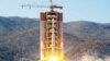 A North Korean long-range rocket is launched into the air at the Sohae rocket launch site, North Korea, in this photo released by Kyodo, Feb. 7, 2016. 