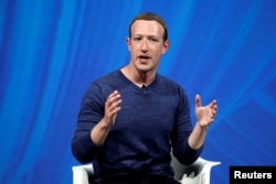FILE - Facebook's founder and CEO Mark Zuckerberg speaks at the Viva Tech start-up and technology summit in Paris, France, May 24, 2018