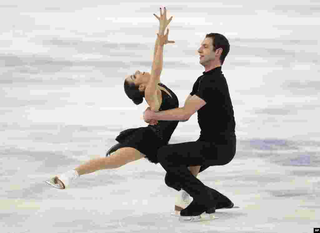 Marissa Castelli e Simon Shnapir dos Estados Unidos, Jogos Olímpicos de Inverno, Sochi, Fev. 11, 2014, Rússia