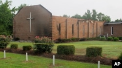 The Mount Zion AME Church in Greeleyville, South Carolina, is seen on July 1, 2015, after it was heavily damaged by fire. 