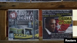 A DVD production called Obama in Cuba is displayed for sale alongside pirated CDs in Havana, April 15, 2016.