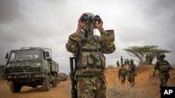 Kenya Defense Forces prepare to occupy Kismayo in October, 2012 to enforce charcoal ban. One year later, exports increased to more than $25 million.