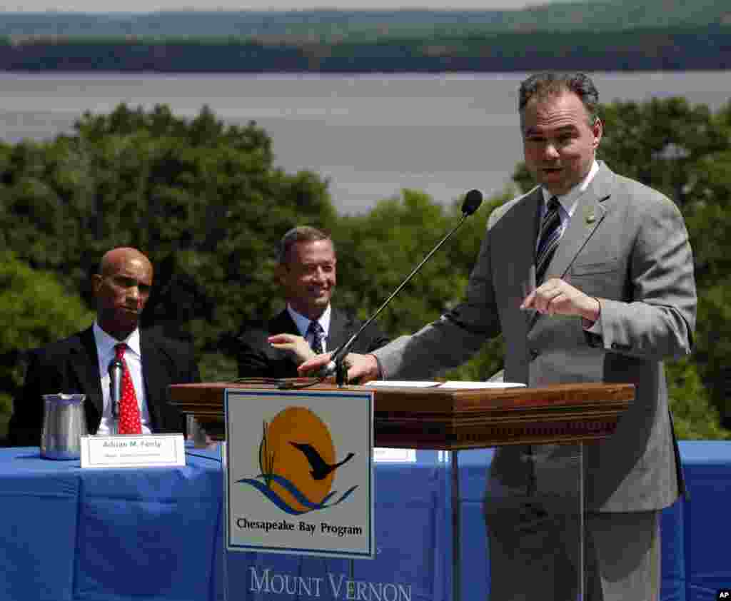With the Potomac River in the background, District of Columbia Mayor Adrian Fenty, left, and Maryland Gov. Martin O&#39;Malley, center, listen to Virginia Gov. Time Kaine, right, speak at a news conference about proposed cleanup measures for the Chesapeake Bay watershed, at the Mount Vernon Estate in Mt. Vernon, Virginia, May 12, 2009.