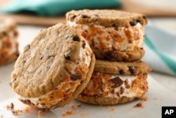 You can even have a cookie sandwich made with ice cream. Shown here is a Pillsbury Peanut Butter Chocolate Chip Cookie Ice Cream Sandwich. (PRNewsFoto/Pillsbury)
