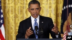 President Barack Obama speaks about the debt limit in the East Room of the White House in Washington, Jan. 14, 2013. 