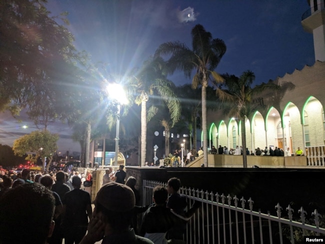 People gather at a vigil for Christchurch shootings victims at Lakemba Mosque in Sydney, Australia, March 15, 2019 in this picture obtained from social media.