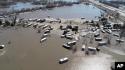This March 20, 2019, aerial photo shows flooding near the Platte River in in Plattsmouth, Neb., south of Omaha.
