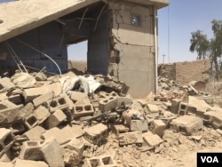 One of the houses bombed to rubble during the latest Iraqi Kurdish offensive, where Peshmerga forces retook nine villages east of the IS stronghold of Mosul, June 6, 2016. (S. Behn/VOA)