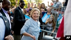 Democratic presidential candidate Hillary Clinton departs after speaking at the 49th Annual Salute to Labor at Illiniwek Park Riverfront in Hampton, Illinois, Sept. 5, 2016.