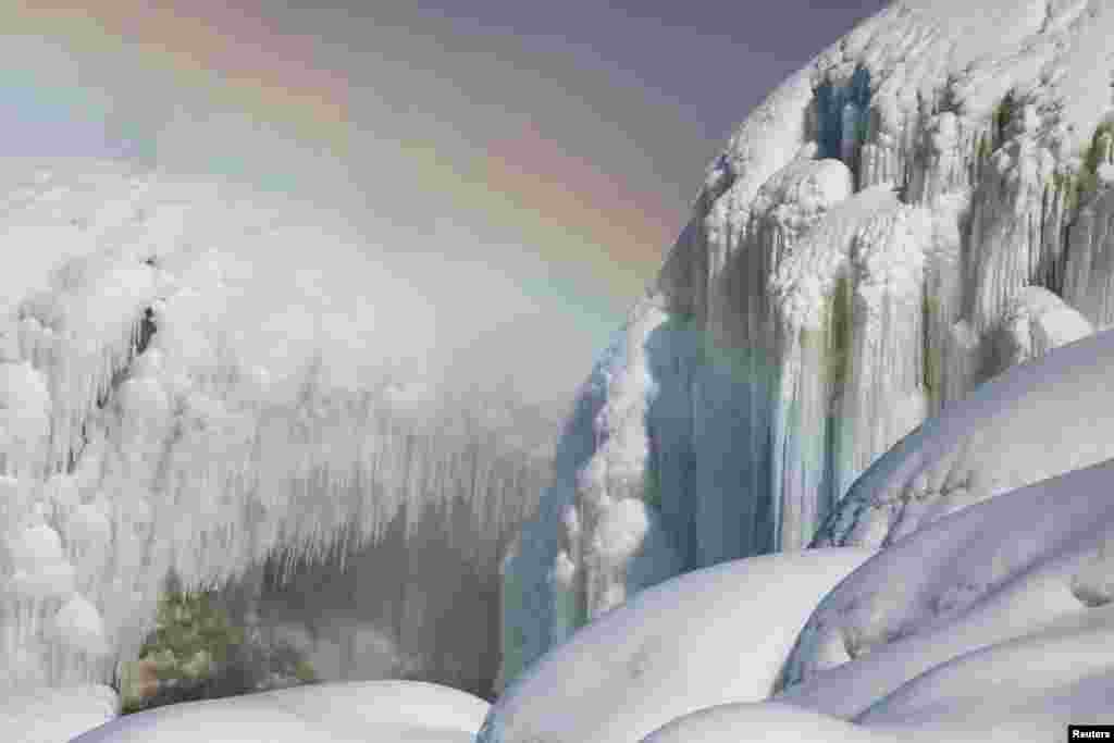 Ice sits at the base of the American Falls due to cold temperatures in Niagara Falls, New York.