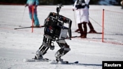 Robot Rudolph participates in the Ski Robot Challenge at the Welli Hilli ski resort in Hoenseong, South Korea, February 12, 2018. REUTERS/Kim Hong-Ji