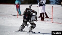 Robot Rudolph participates in the Ski Robot Challenge at the Welli Hilli ski resort in Hoenseong, South Korea, February 12, 2018. REUTERS/Kim Hong-Ji