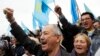 Crimean Tatars gather for a rally commemorating the 70th anniversary of Stalin's mass deportation in Simferopol, Crimea, May 18, 2014. Crimean Tatars.