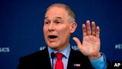 FILE - Environmental Protection Agency Administrator Scott Pruitt speaks at a news conference at EPA headquarters, in Washington, April 3, 2018.