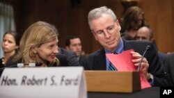 FILE - Robert Ford, U.S. ambassador to Syria, arrives to testify to the Senate Foreign Relations Committee about the conflict in Syria, on Capitol Hill in Washington.