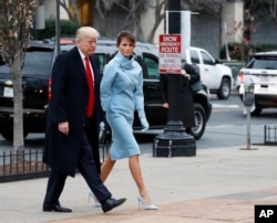 President-elect Donald Trump and his wife, Melania, arrive for a church service at St. John’s Episcopal Church across from the White House in Washington, Jan. 20, 2017.