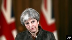 La Première ministre britannique Theresa May lors d'une conférence de presse au 10 Downing Street, Londres, le 14 avril 2018. 