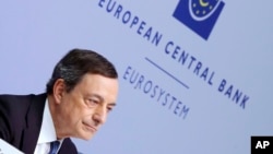 FILE - President of European Central Bank Mario Draghi speaks during a press conference following a meeting of the governing council in Frankfurt, Germany, March 10, 2016.