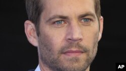 Actor Paul Walker arrives for the World Premiere of Fast & Furious 6, at a central London cinema in Leicester Square, May 7, 2013.