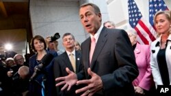 Ketua DPR AS, John Boehner didampingi anggota DPR AS dari faksi Republik memberikan keterangan pers di gedung Capitol (10/10). 