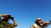 Լիբիայի ապստամբները մեղադրել են ՆԱՏՕ-ին թերանալու մեջ