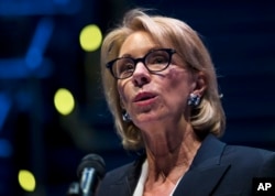 FILE - Education Secretary Betsy DeVos speaks during a student town hall at National Constitution Center in Philadelphia.