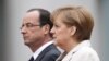 Hollande llega a Berlín en medio de la tormenta