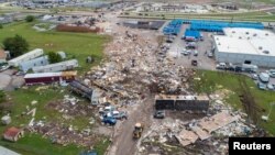 A path of destruction through the American Budget Value Inn and Skyview Mobile Park Estates is seen in an aerial photo after a tornado touched down overnight in El Reno, Okla.,May 26, 2019. 